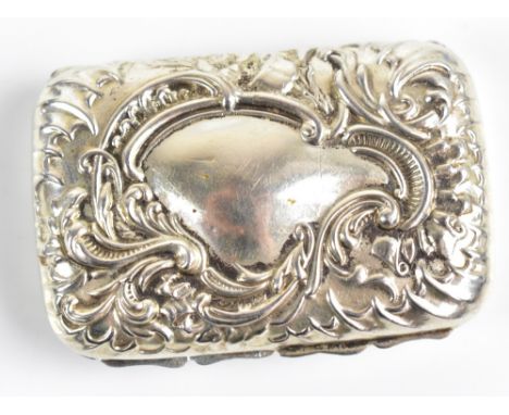 JOSEPH GLOSTER; an Elizabeth II hallmarked silver snuff box of rectangular form, with repoussé floral decoration surrounding 