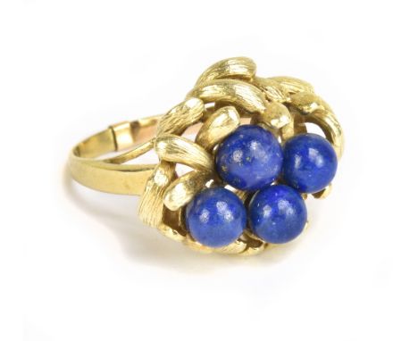 A 14ct gold and simulated lapis lazuli ring with elaborate setting, set with a spacer so unable to give ring size, approx 8.8