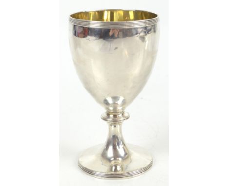 CHARLES ALDRIDGE; a good George III hallmarked silver goblet with gilt washed interior, reeded rim knopped stem and spreading