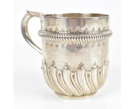 EDWARD BARNARD &amp; SONS LTD; a late Victorian hallmarked silver mug, decorated in relief with a ring around the top section