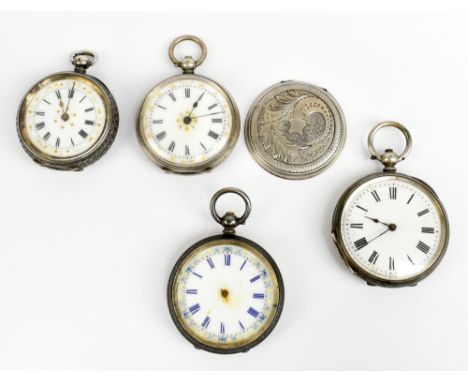 A group of four Continental white metal fob watches with white enamel dials set with Roman numerals, various states of disrep