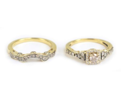 LE VIAN; a 14ct yellow gold and diamond set ring with a matching half eternity ring, size J 1/2 and K 1/2, combined approx 5.