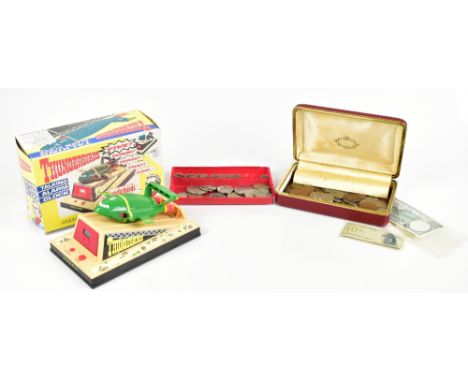 A small collection of assorted coinage including one and two shillings, half pennies, etc, also a Wesco Thunderbirds talking 