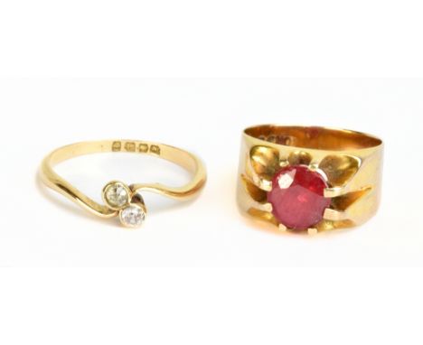 An 18ct yellow gold crossover ring, size K 1/2, approx 1.6g, and a 10ct yellow gold dress ring, size G, approx 6.6g (2).Addit