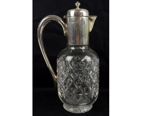JAMES DIXON &amp; SONS; an Edwardian hallmarked silver mounted cut glass claret jug with hinged domed lid, plain loop handle 