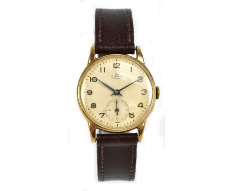SMITHS; a 9ct yellow gold cased 'De Luxe' mechanical railway service presentation wristwatch, the circular dial set with Arab