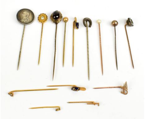 A group of fourteen assorted stick pins including Masonic examples, one with a Victorian coin, one with horseshoe, etc.Additi