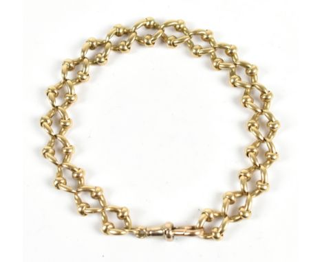 A late 19th/early 20th century 9ct yellow gold fancy link bracelet, length 21cm, approx 33.2g.Additional InformationLight gen
