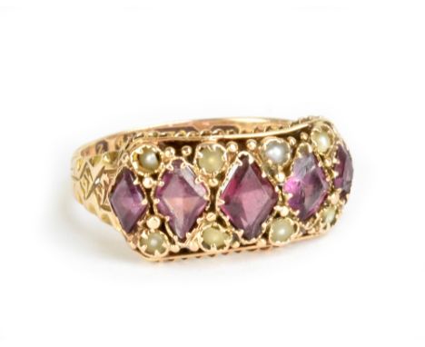 A 15ct yellow gold seed pearl and amethyst dress ring, size J, approx 2.2g.Additional InformationSome knocks to the setting, 