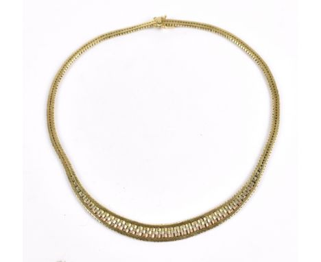 A triple tone 9ct yellow gold choker necklace, length 40cm, approx 32.7g.Additional InformationLight general wear.