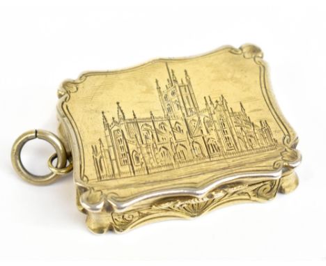 NATHANIEL MILLS; a Victorian hallmarked silver castle top vinaigrette of shaped rectangular form, with chased detail depictin