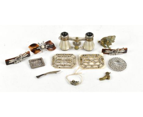 Several costume jewellery brooches, decorative hair clips, a pair of mother of pearl detailed opera glasses, a Japanese ojime