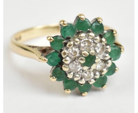 A 9ct yellow gold emerald and diamond cluster dress ring, size K, approx 3.3g.