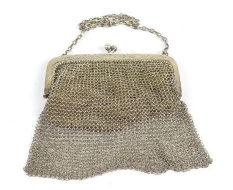 A silver mesh purse with import marks and kid leather lining, 10.5 x 10cm, combined 2.09ozt/65.1g.Additional InformationSome 