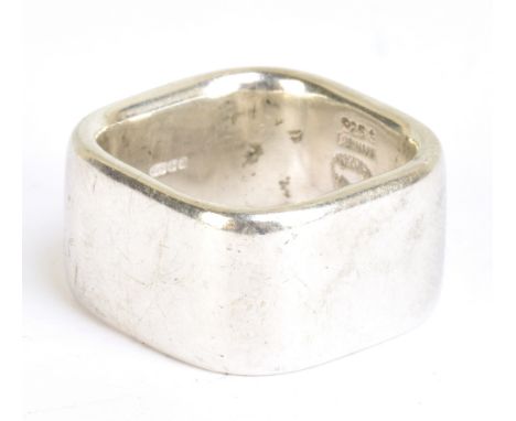 GEORG JENSEN; a 1960s silver ring designed by Kim Naver of rounded square form, fully marked and no.186, size H 1/2, approx 1