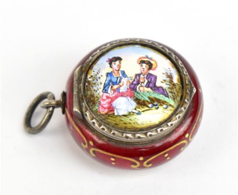 A 19th century Continental gilt metal and enamel vinaigrette of circular form, decorated with figures in landscape setting in
