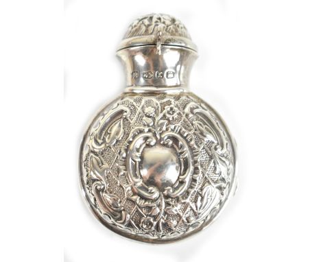 A &amp; ZIMMERMAN LTD: a late Victorian hallmarked silver scent bottle case, the hinged lid and&nbsp; body decorated with emb