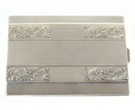 A mid-20th century Czechoslovakian .900 silver cigarette case with engine turned, reeded and bright cut foliate decoration, m