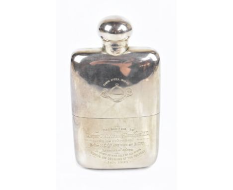 ROBERT PRINGLE &amp; SONS; a military interest Edwardian hallmarked silver hip flask, with screw cover and lift-off base sect