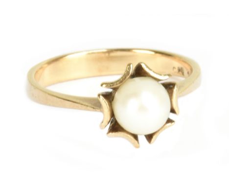 A 9ct yellow gold and cultured pearl dress ring, size O, approx 2.8g.Additional InformationIn good condition.