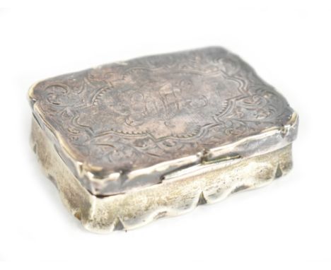 A late Victorian hallmarked silver snuff box of rectangular form, the hinged lid with engraved initials 'G.R.' within a scrol