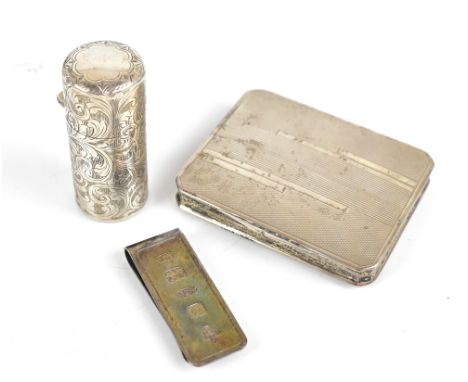 G WATTS &amp; CO; an Edward VII hallmarked silver perfume bottle with clear glass liner and stopper, the outer case with chas