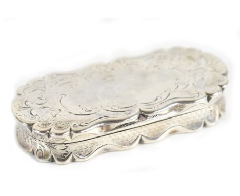 GEORGE WHEELER &amp; CO; a Victorian hallmarked silver snuff box of rounded rectangular form, with allover scroll engraved de