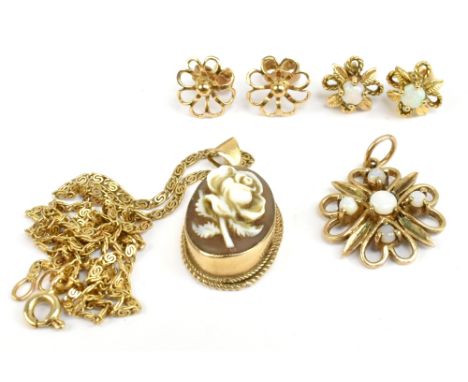 A small group of jewellery including a 9ct yellow gold mounted floral cameo, a 9ct yellow gold open work opal pendant etc, co