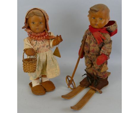 Two Goebel Hummel dolls, one of a boy entitled on tag "Ski-Maserl", with a pair of wooden skis and one cane stick 29cm high, 