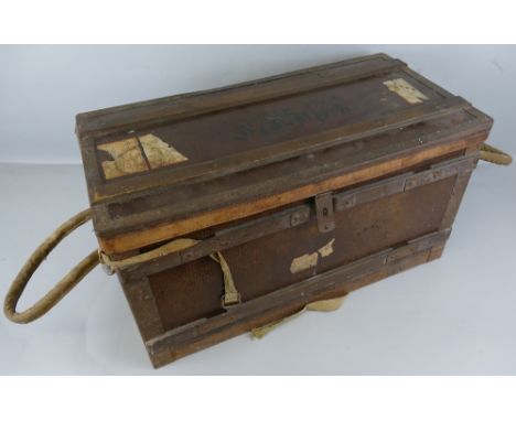 A WW2 Japanese iron bound wooden trunk, of oblong form, the leather edged hinged lid with document pouch to the inside and pl
