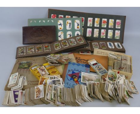 Cigarette  cards - a large collection of cigarette and trade cards, loose and in albums includings Wills, Players, R and J Hi