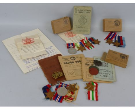 A group of four WW2 medals, awarded to Merchant Navy seaman Gordon Marshall comprising War Medal 1939-45, Atlantic, Italy and