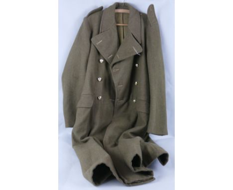 A British Army Royal Ordnance Corp great coat, size 11 dated 1953
