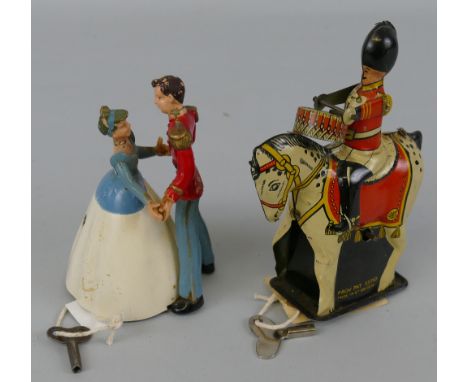 Wells Brimtoy - clockwork tin-plate military drummer on horseback, 15cm high and clockwork plastic dancing group of Prince Ch