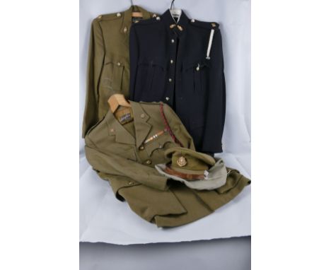 Three Officer's uniforms, Royal Army Ordnance Corp dress and parade uniforms, together with an East Yorkshire Regiment unifor