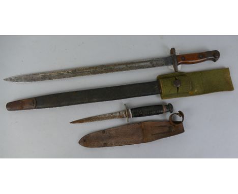 A British pattern 1907 bayonet, with 43cm fullered steel blade, leather covered scabbard and green webbing frog 57cm overall,