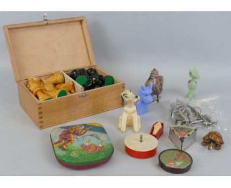 A turned wooden Staunton pattern chess set, key 8.5cm high, in wooden box, a 1950's Sharp and Sons toffee tin decorated with 