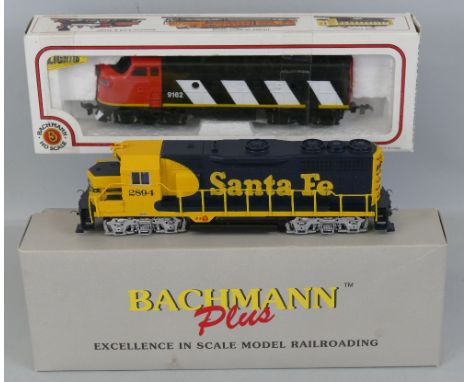 Bachmann "HO" scale - two locomotives, comprising Canadian National Zebra Stripe Scheme EMD diesel No.9162 and Plus Series EM