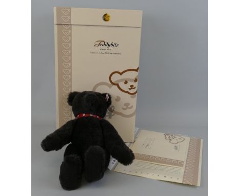 Steiff limited edition Black teddy bear with red collar, No.918/3000, 32cm high, boxed with certificate, EAN 038150