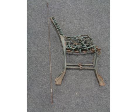 A pair of cast iron bench ends 