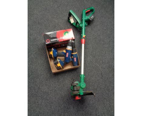 A Qualcast electric strimmer and a box containing boxed CCTV camera and two Ryobi drills  