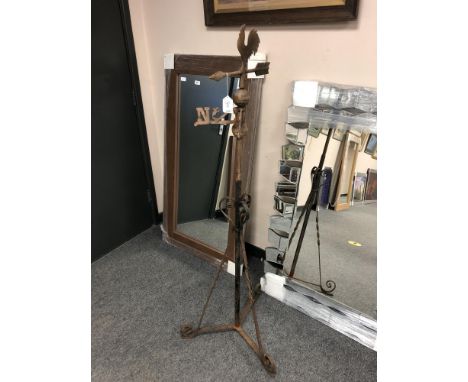 A wrought iron weather vane
