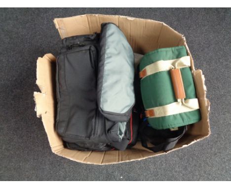 A box of camera and in-car DVD bags 