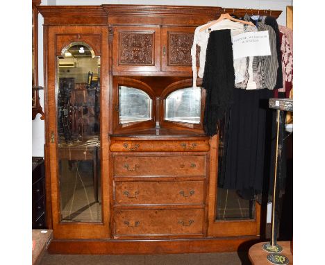 A gentleman's Victorian burr oak and pollard brown oak wardrobe by Maple &amp; Co, with breakfront pediment, carved panel doo