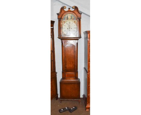 An oak cased eight day longcase clock