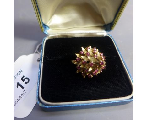 An 18ct yellow gold and ruby set pointed princess ring, 7g