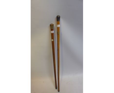 A 18ct gold mounted walnut walking stick together with one other. 