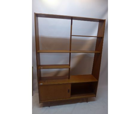 A vintage 20th Century teak display bookcase shelf unit above cupboard with sliding doors H: 168cm W: 120cm D: 29cm