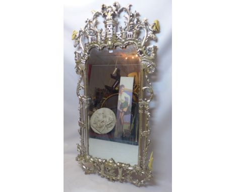 A Chippendale style silver gilt framed mirror in the Chinese taste with bevelled plate, 203cm x 99cm