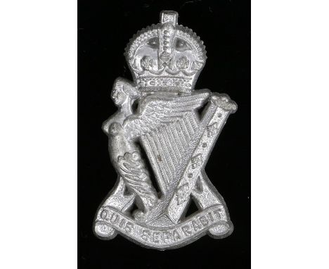 World War Two plastic economy cap badge to the Royal Ulster Rifles, in silver grey, two blades to the reverse, K&amp;K